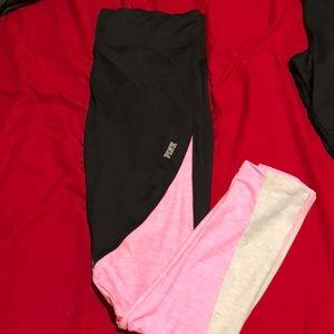 Two pairs of PINK color block leggings
